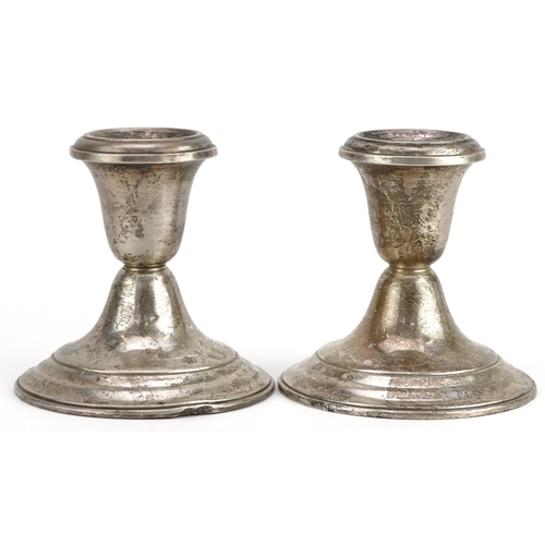 1167 - Gorham, pair of American sterling silver circular dwarf candlesticks, 8.5cm high, 468.5g