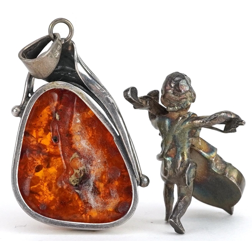 1163 - Naturalistic silver and amber pendant and a miniature silver figure of Putti playing a cello, 5cm hi... 