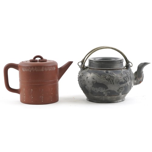 1245 - Two Chinese teapots including Yixing terracotta example with liner, the largest 18cm in length