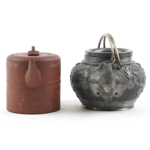 1245 - Two Chinese teapots including Yixing terracotta example with liner, the largest 18cm in length