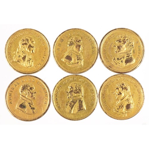 1426 - Six antique gilt metal tokens commemorating naval victories housed in a cylindrical pot with pierced... 