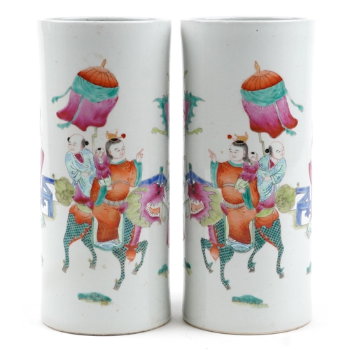 305 - Pair of Chinese porcelain cylindrical vases hand painted in the famille rose palette with a family p... 