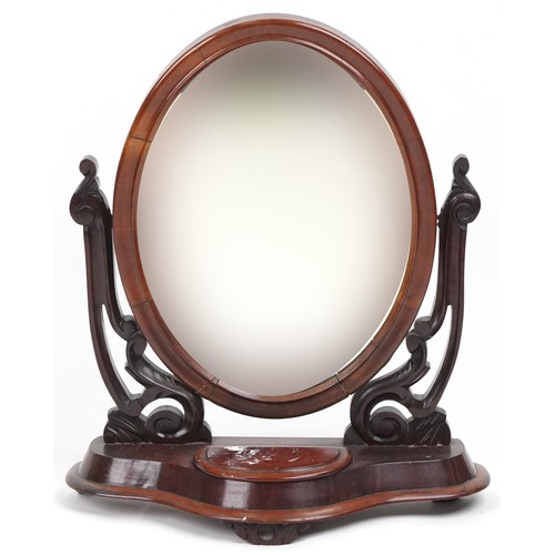 1023 - Victorian mahogany swing mirror with hinged jewellery compartment to the base, 69cm high