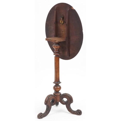 1079 - Victorian carved walnut tilt top occasional table with tripod base, 68cm high x 50cm in diameter