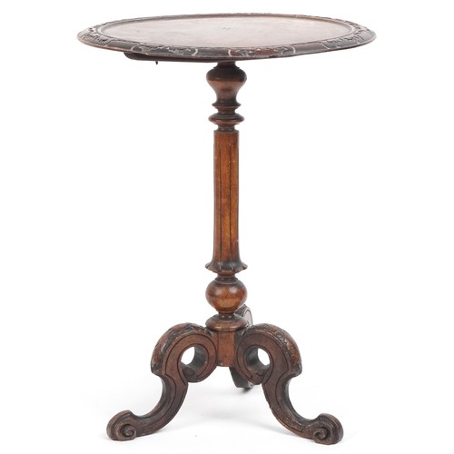 1079 - Victorian carved walnut tilt top occasional table with tripod base, 68cm high x 50cm in diameter