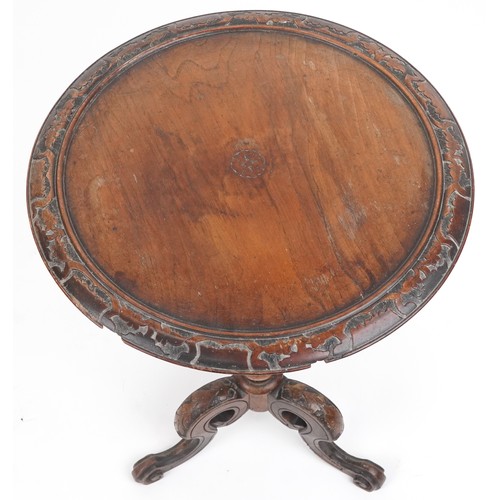 1079 - Victorian carved walnut tilt top occasional table with tripod base, 68cm high x 50cm in diameter