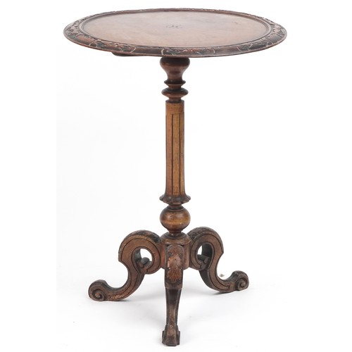 1079 - Victorian carved walnut tilt top occasional table with tripod base, 68cm high x 50cm in diameter