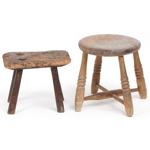 1057 - Two antique wooden stools, the largest 31cm high