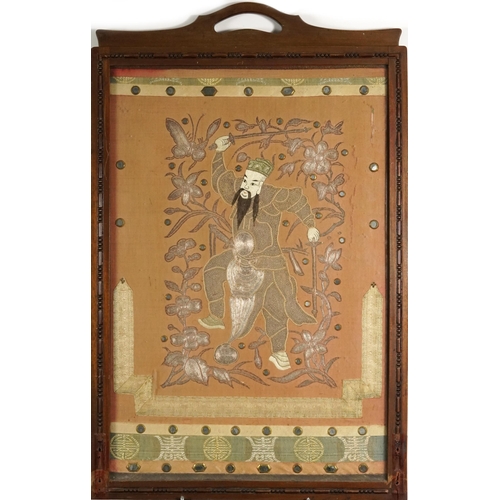 1142 - Chinese textile embroidered with an emperor housed in a mahogany frame, framed and glazed, 59cm x 46... 