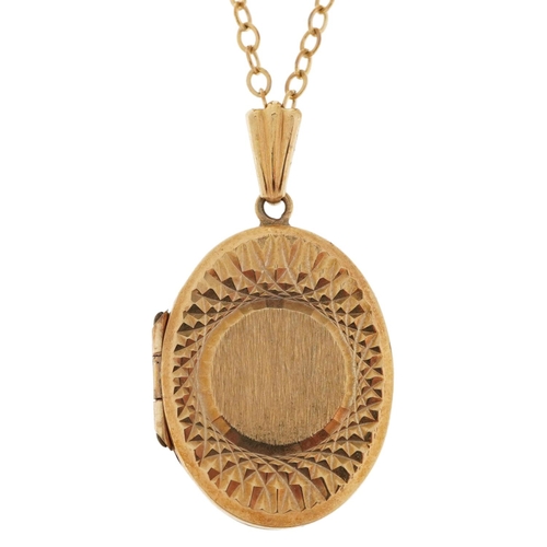 2208 - 9ct gold oval locket with engine turned decoration on 9ct gold Belcher link necklace, 3.1cm high and... 