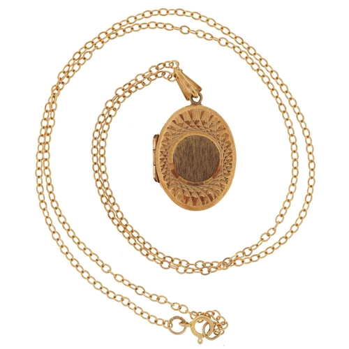 2208 - 9ct gold oval locket with engine turned decoration on 9ct gold Belcher link necklace, 3.1cm high and... 