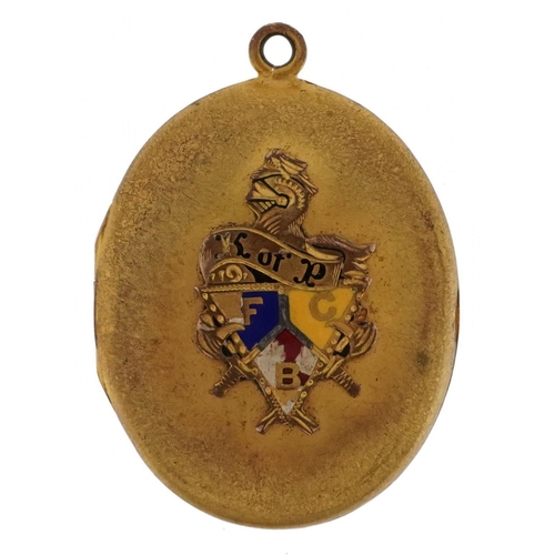 2210 - Victorian American interest Gilt metal and enamel Knights of Pythias oval locket with applied armori... 