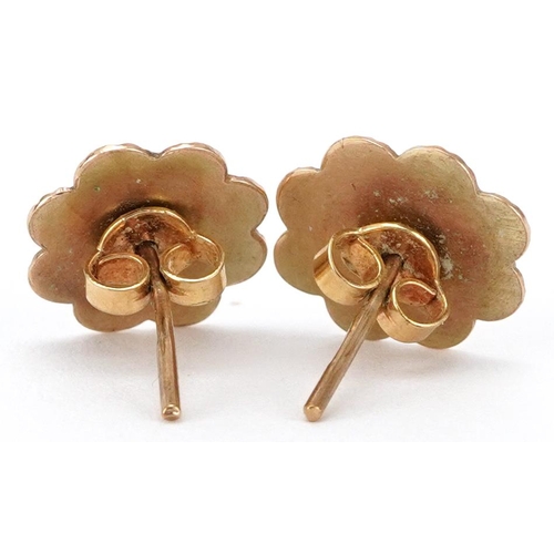 2470 - Pair of 9ct gold stud earrings with engine turned decoration, 1.2cm high, 1.0g