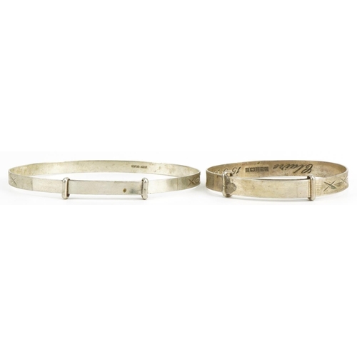 2605 - Two silver christening bangles with engraved decoration, one hallmarked 1973, total 9.1g