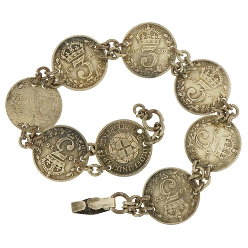 2623 - George V threepence coin bracelet with various dates including 1915, 1916 and 1937, 14.6g