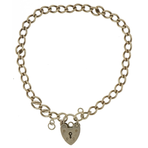 2497 - Silver curb link bracelet with love heart padlock, 19cm in length, 6.8g