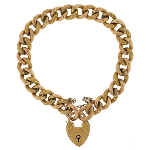 2066 - Edwardian 9ct rose gold floral engraved bracelet with 9ct gold love heart padlock, 18cm in length, 1... 