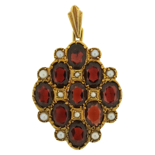 2167 - 14ct gold garnet and seed pearl cluster pendant, 3.8cm high, 6.8g