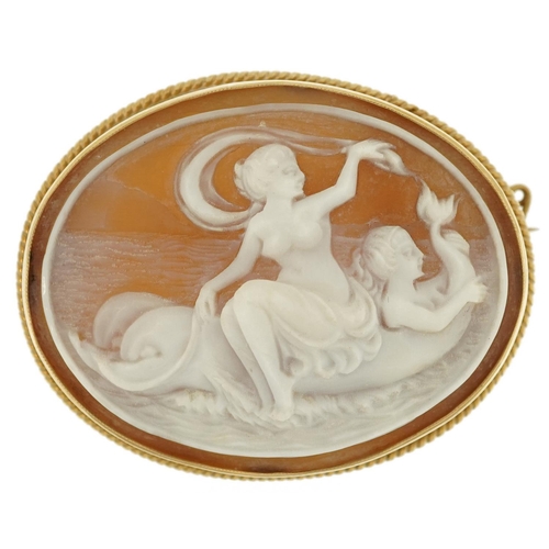 2137 - 9ct gold mounted cameo shell brooch carved with two maidens riding dolphins, 4.3cm wide, 12.5g