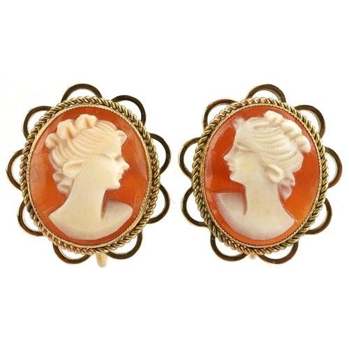 2260 - Pair of 9ct gold mounted cameo shell screw back earrings carved with maiden heads housed in a W A Mu... 