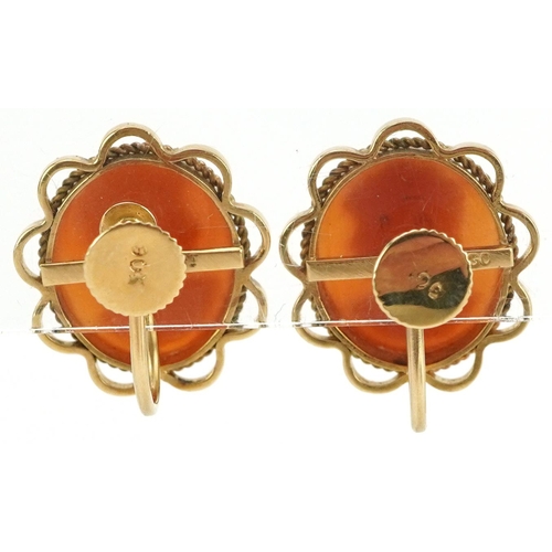 2260 - Pair of 9ct gold mounted cameo shell screw back earrings carved with maiden heads housed in a W A Mu... 