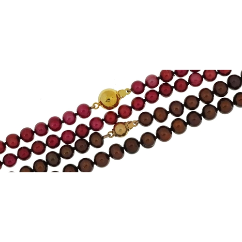 2725 - Two pink and brown cultured pearl necklaces with 9ct gold ball clasps, each 45cm in length, total 39... 