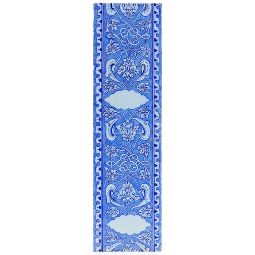 265 - Turkish Ottoman Iznik tile hand painted with flowers and scrolling foliage, 39.5cm x 11cm