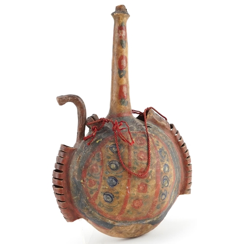 150 - Islamic vellum flask hand painted with stylised floral motifs, 35cm high