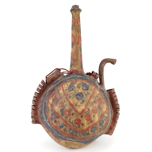 150 - Islamic vellum flask hand painted with stylised floral motifs, 35cm high