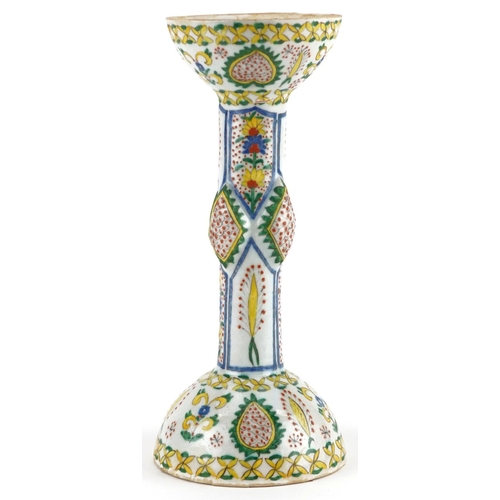 52 - Turkish Ottoman Kutahya candle holder hand painted with stylised flowers, 29cm high