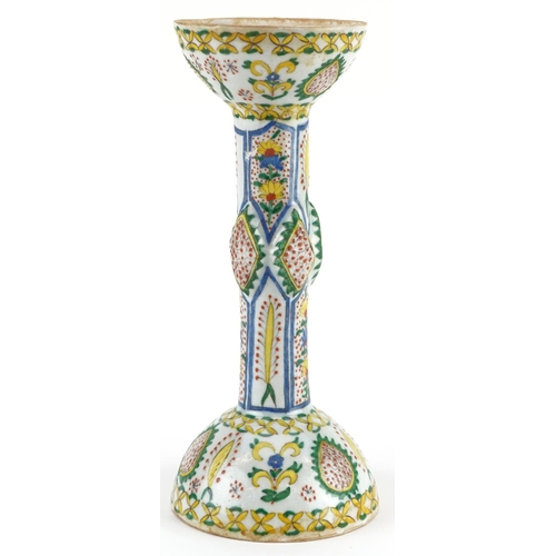 52 - Turkish Ottoman Kutahya candle holder hand painted with stylised flowers, 29cm high