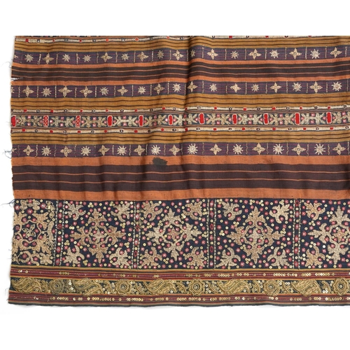 382 - Islamic gold braided textile embroidered with flowers and a robe, the robe 115cm high