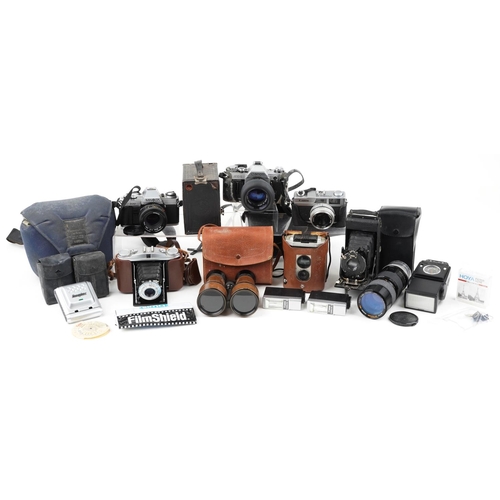 1253 - Vintage and later cameras and accessories including Minolta X-300, Canon AE-1 and Kodak Brownie no 2... 