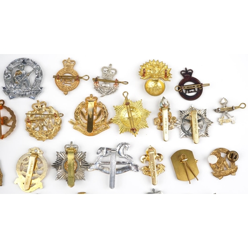 633 - Collection of military interest cap badges, some Staybrite including RAF, Gurkha Transport Regiment ... 