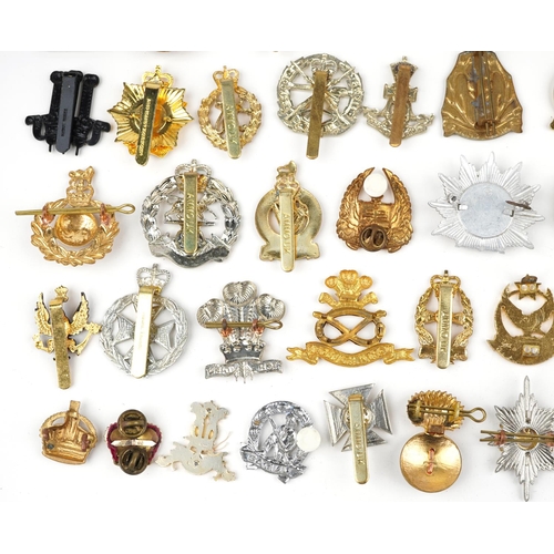 633 - Collection of military interest cap badges, some Staybrite including RAF, Gurkha Transport Regiment ... 