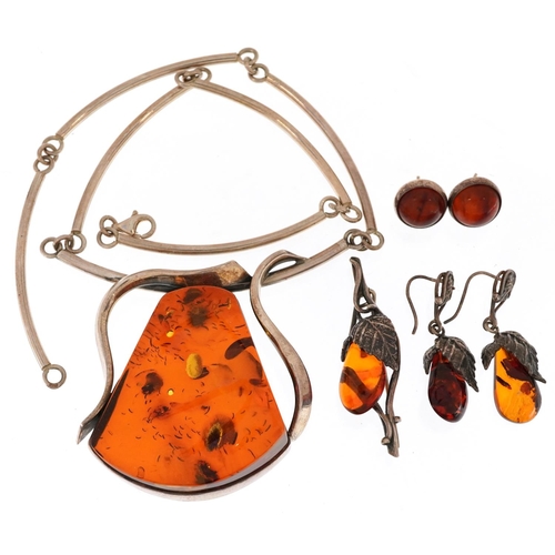 2748 - Silver and natural amber jewellery including a large necklace, naturalistic brooch and earrings, tot... 