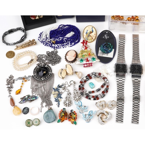 2777 - Vintage and later costume jewellery and wristwatches including clip on earrings, brooches, necklaces... 