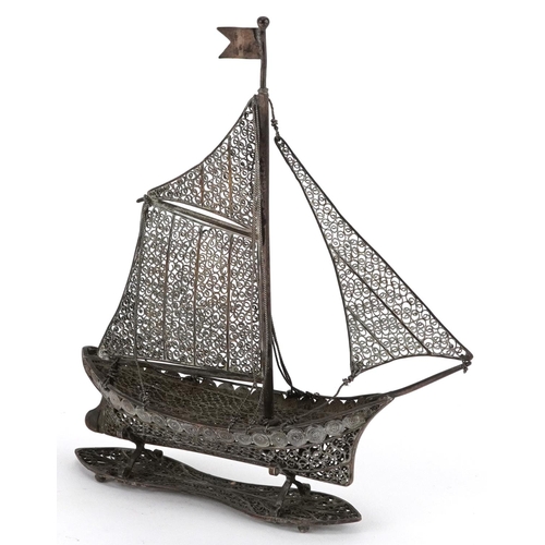 329 - Maltese unmarked silver filigree model of a sailing boat, 13cm high, 54.5g