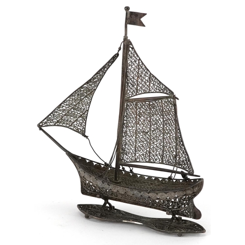 329 - Maltese unmarked silver filigree model of a sailing boat, 13cm high, 54.5g