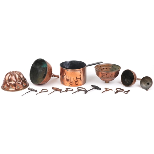 581 - 18th/19th century and later kitchenalia including four copper funnels, jelly mould, saucepan and cor... 