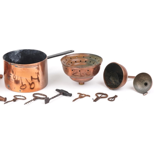 581 - 18th/19th century and later kitchenalia including four copper funnels, jelly mould, saucepan and cor... 