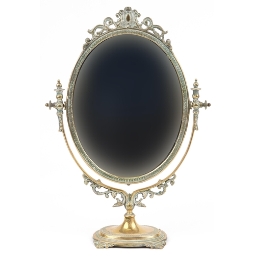 1308 - Vintage classical brass swing mirror with urn finials, 52cm high