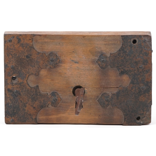 96 - Antique wooden lock with iron mounts and key, 25.5cm x 16cm