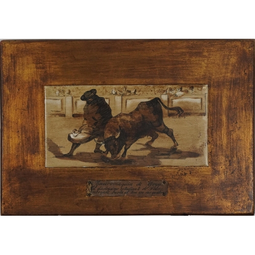 1310 - Rectangular Spanish tile hand painted with a matador and bull with inscribed label, inscribed Bought... 