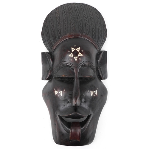 1525 - Large African tribal interest carved hardwood wall mask with bone inlay, 75cm high