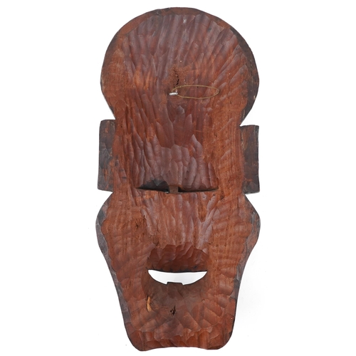 1525 - Large African tribal interest carved hardwood wall mask with bone inlay, 75cm high