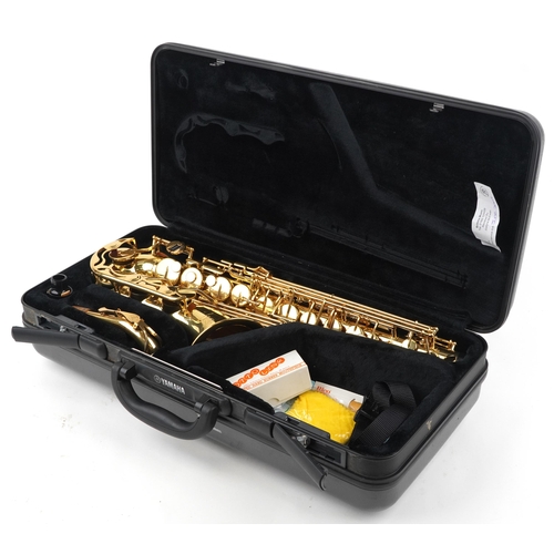 1202 - Yamaha YAS-275 alto saxophone, with fitted travel case, serial number 154697, 64cm in length