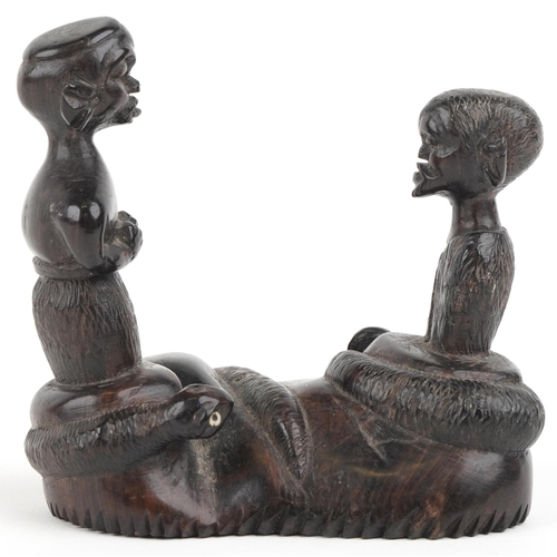 1362 - African tribal interest hardwood carving of two figures and two serpents, 10cm wide