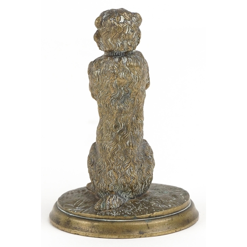 531 - Victorian brass model of a begging Terrier, 10cm high