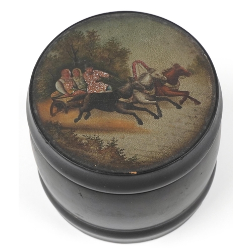 363 - Russian black lacquered cylindrical tobacco jar with lift off lid hand painted with a troika, variou... 